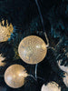 Lyskjede med LED-kuler - Gylden beige