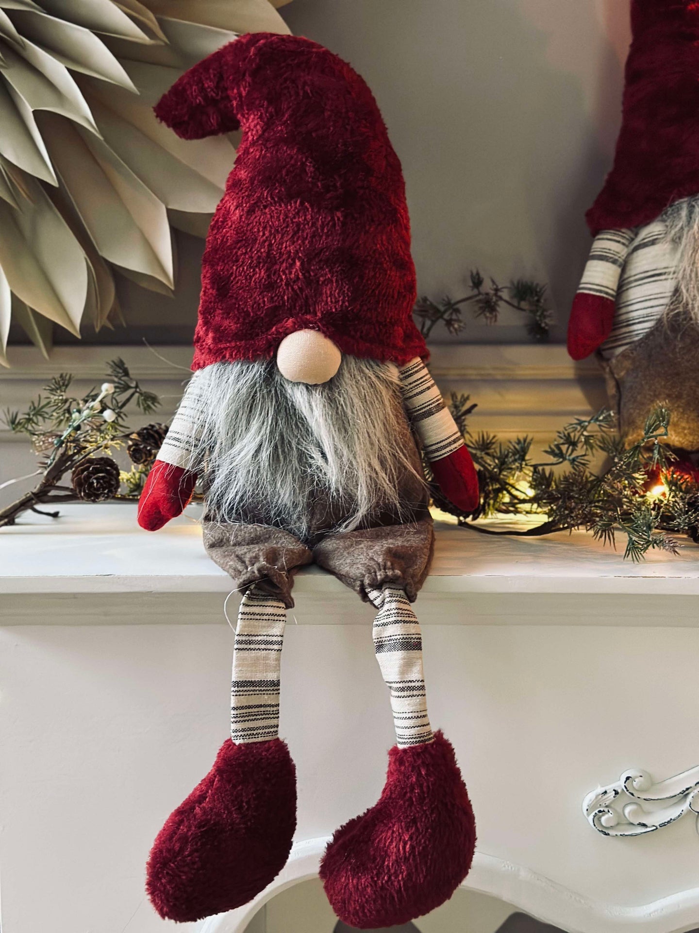 Nisse med hengende ben