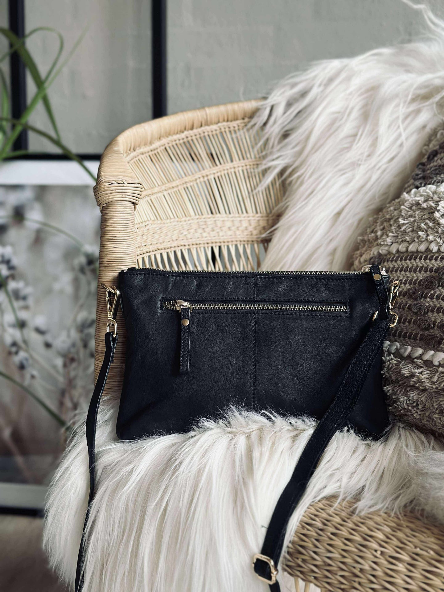 Clutch i svart skinn