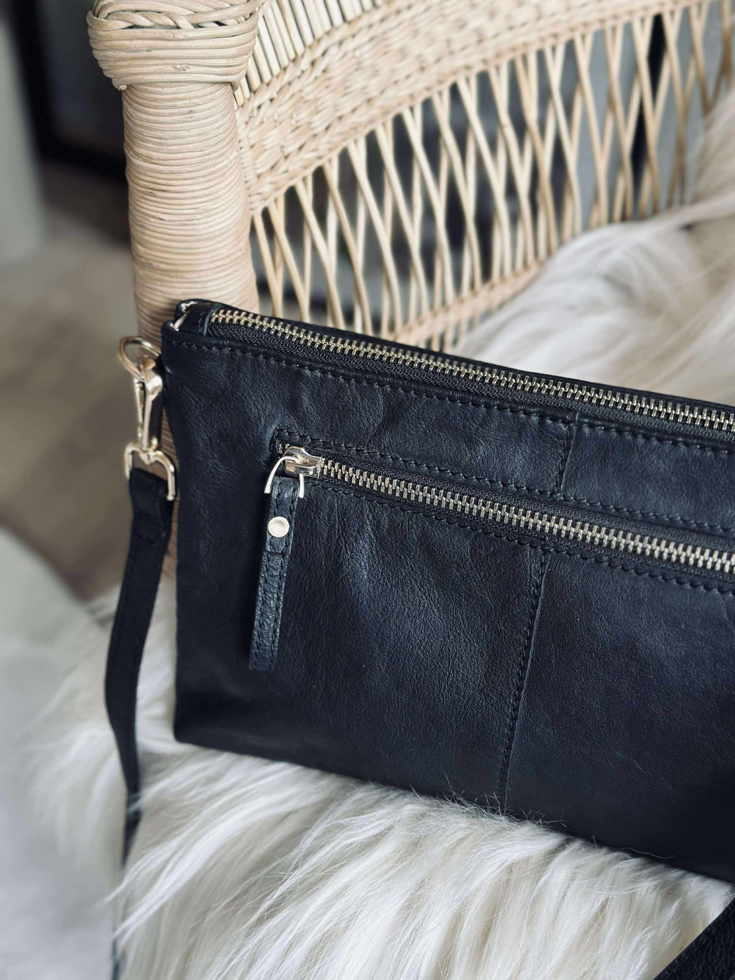 Clutch i svart skinn