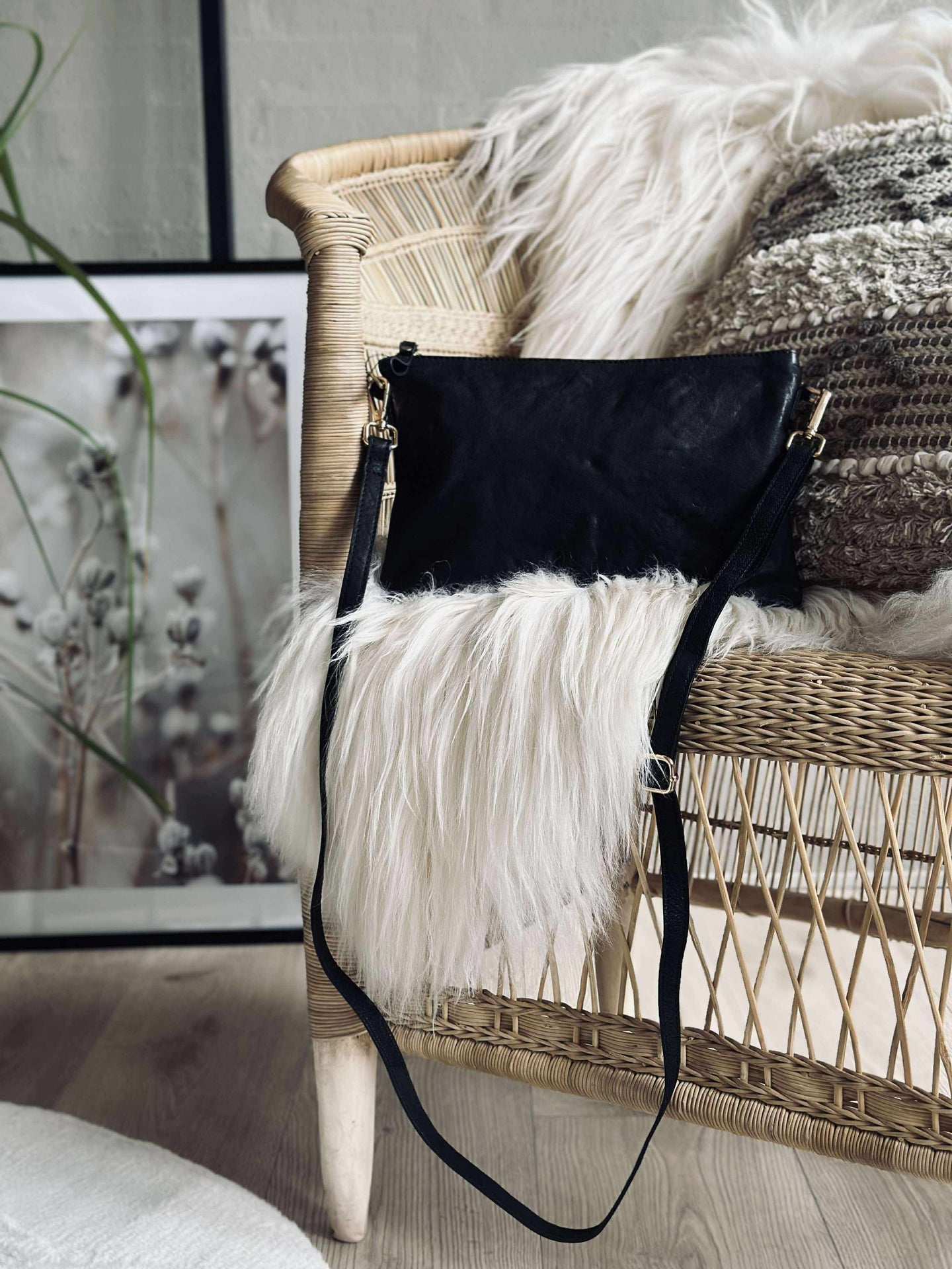 Clutch i svart skinn