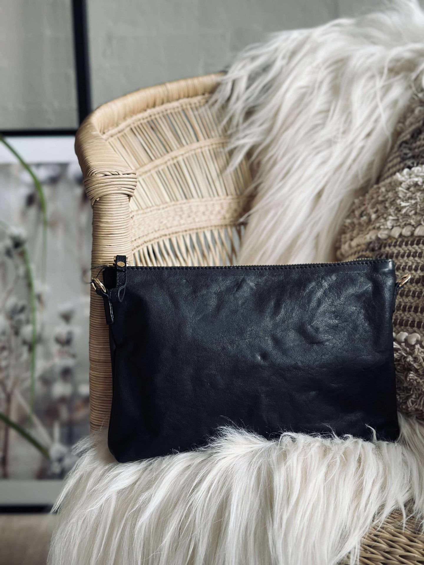 Clutch i svart skinn