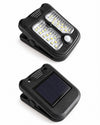 Clip-on lampe med solcelle og sensor
