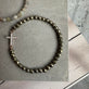 Armbånd Nikki pyrit Onyx - Forgyldt Sterling silver kors - VIAMAJA.DK