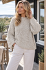 Strikk boucle beige