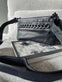 Clutch Black - dekoreret med metalkæde - VIAMAJA.DK