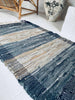 Gulvteppe i flettet skinn - 70x140cm
