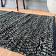 Gulvtæppe i flettet læder - 70x140cm Dark green - VIAMAJA.DK