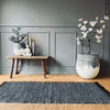 Gulvteppe i flettet skinn - 70x140cm