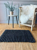 Luksus matte i black jute – 50x80cm