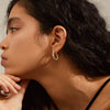 Vridd chunky hoops gullbelagt